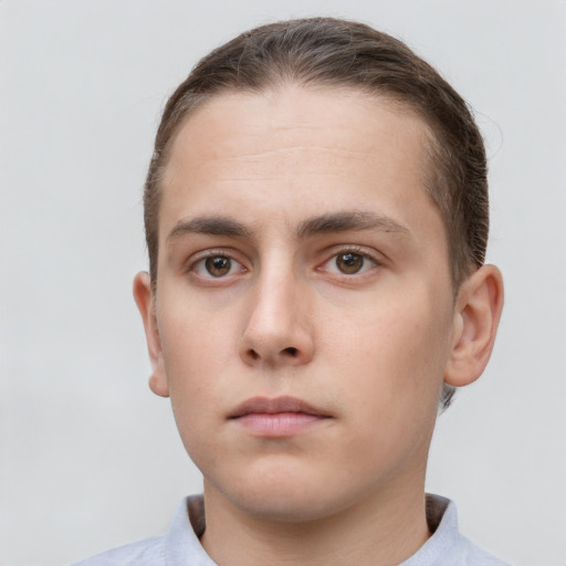 Neutral white young-adult male with short  brown hair and brown eyes