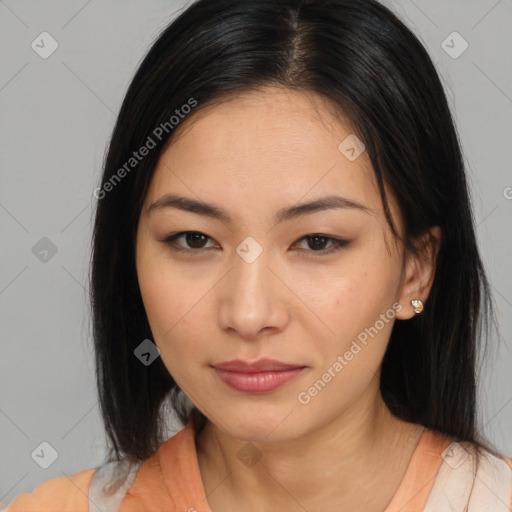 Joyful asian young-adult female with medium  black hair and brown eyes