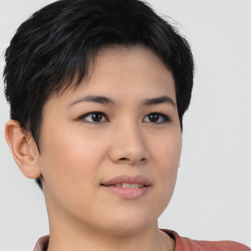 Joyful asian young-adult female with short  brown hair and brown eyes