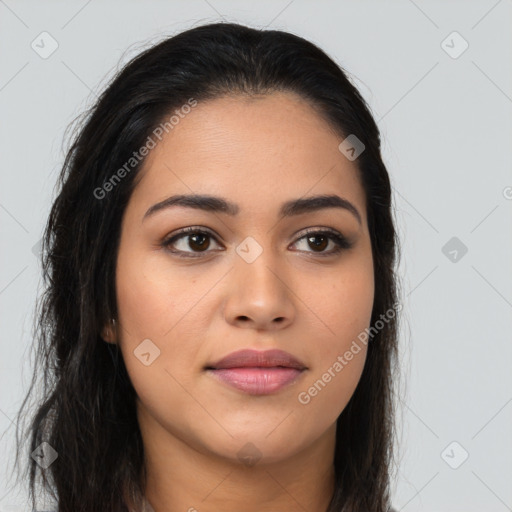 Joyful latino young-adult female with long  brown hair and brown eyes