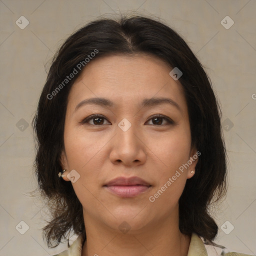 Joyful asian young-adult female with medium  brown hair and brown eyes