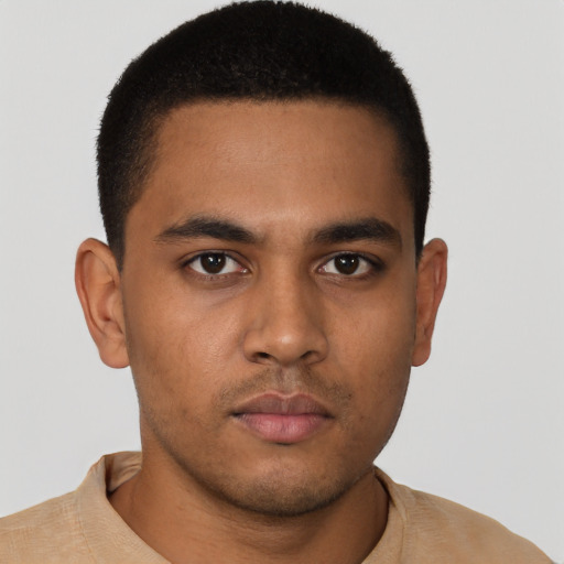 Neutral latino young-adult male with short  brown hair and brown eyes