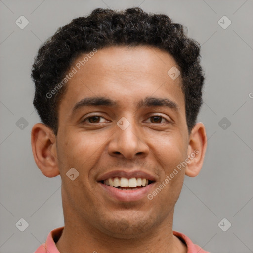 Joyful latino young-adult male with short  brown hair and brown eyes