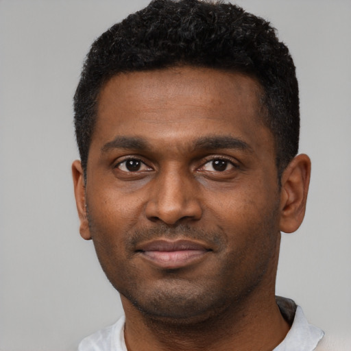 Neutral black young-adult male with short  black hair and brown eyes