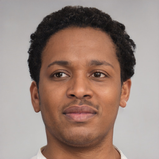 Neutral black young-adult male with short  brown hair and brown eyes