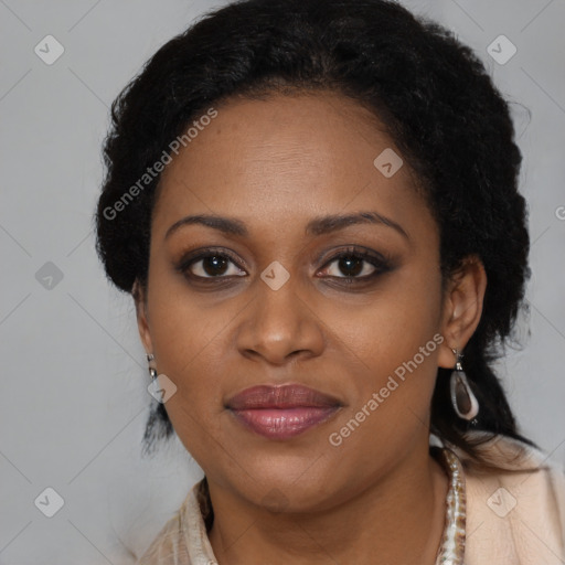 Joyful black young-adult female with long  brown hair and brown eyes
