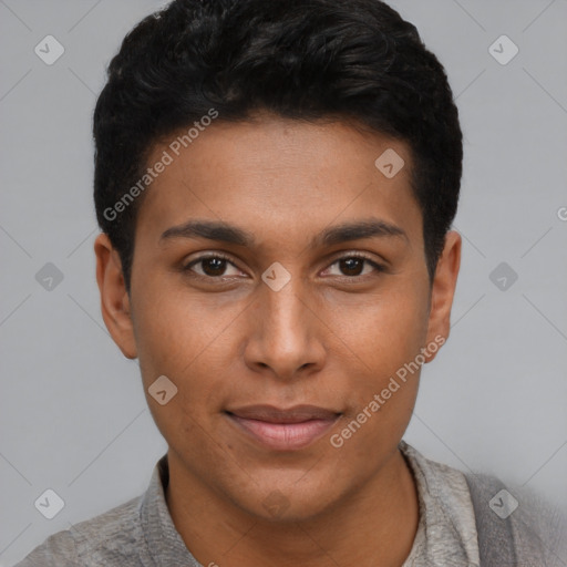 Joyful black young-adult male with short  black hair and brown eyes