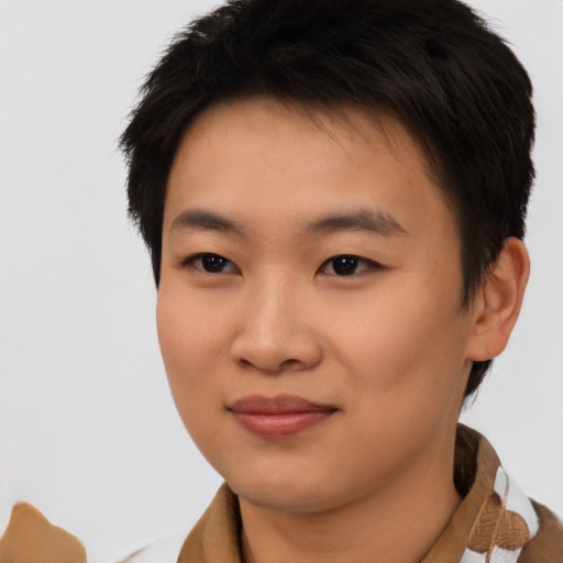 Joyful asian young-adult female with short  brown hair and brown eyes