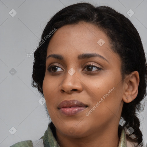 Joyful black young-adult female with medium  black hair and brown eyes