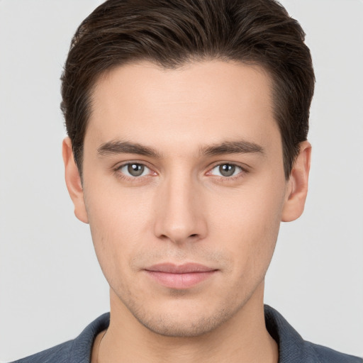 Neutral white young-adult male with short  brown hair and brown eyes