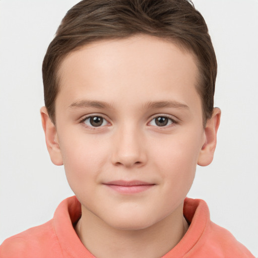 Joyful white child female with short  brown hair and brown eyes