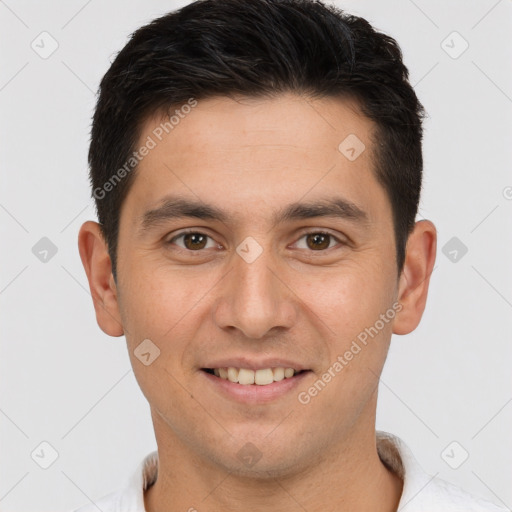 Joyful white young-adult male with short  brown hair and brown eyes