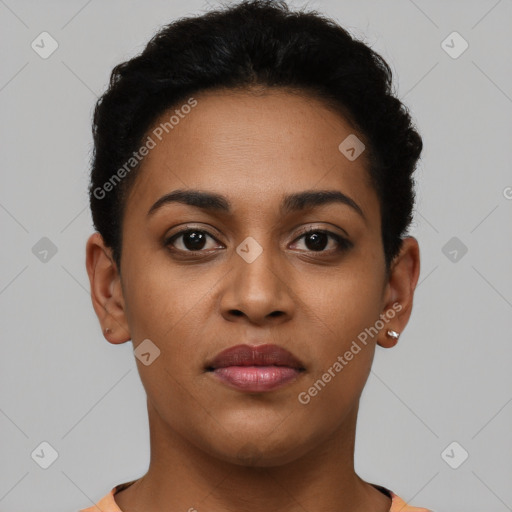 Joyful latino young-adult female with short  brown hair and brown eyes