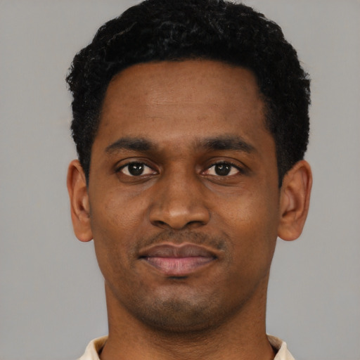Neutral black young-adult male with short  black hair and brown eyes