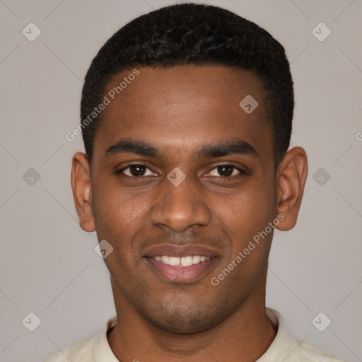 Joyful black young-adult male with short  black hair and brown eyes