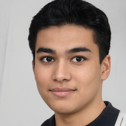 Neutral latino young-adult male with short  black hair and brown eyes