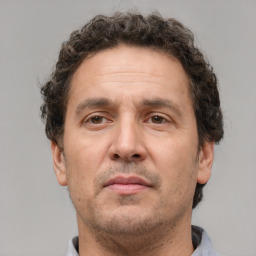 Neutral white adult male with short  brown hair and brown eyes