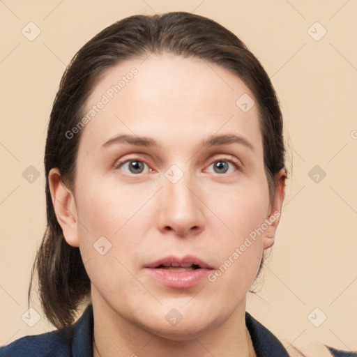 Neutral white young-adult female with medium  brown hair and grey eyes