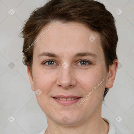 Joyful white young-adult female with short  brown hair and grey eyes