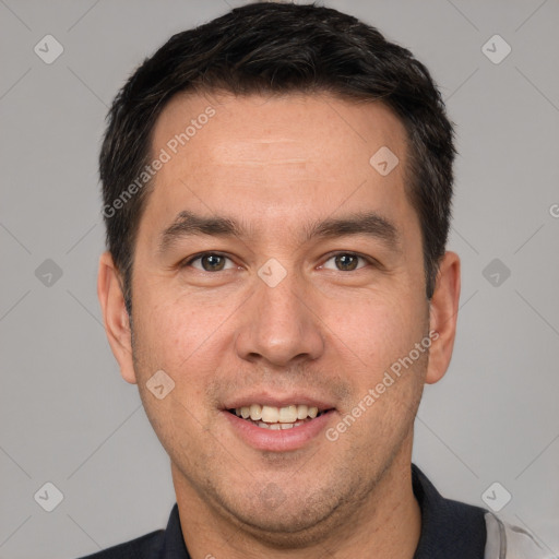 Joyful white adult male with short  brown hair and brown eyes