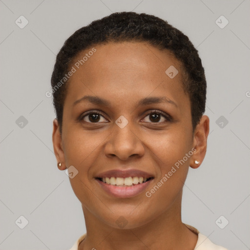 Joyful black young-adult female with short  brown hair and brown eyes