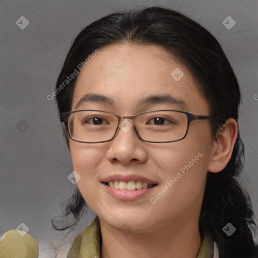 Joyful asian young-adult female with medium  brown hair and brown eyes