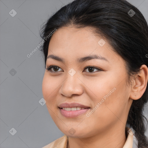 Joyful asian young-adult female with medium  brown hair and brown eyes