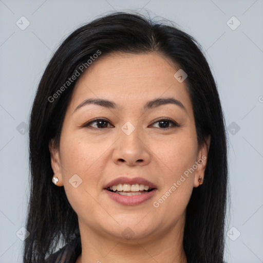 Joyful asian young-adult female with long  brown hair and brown eyes