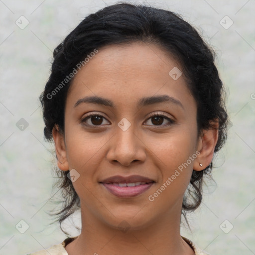 Joyful latino young-adult female with medium  brown hair and brown eyes