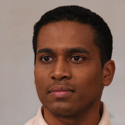 Neutral black young-adult male with short  black hair and brown eyes