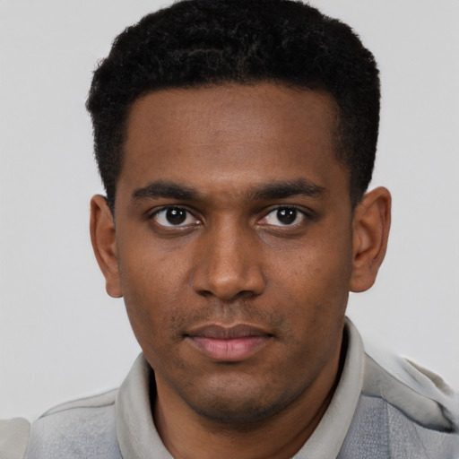 Neutral black young-adult male with short  brown hair and brown eyes