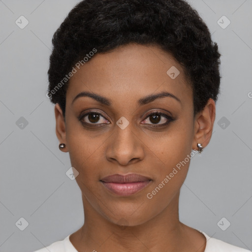 Joyful black young-adult female with short  black hair and brown eyes