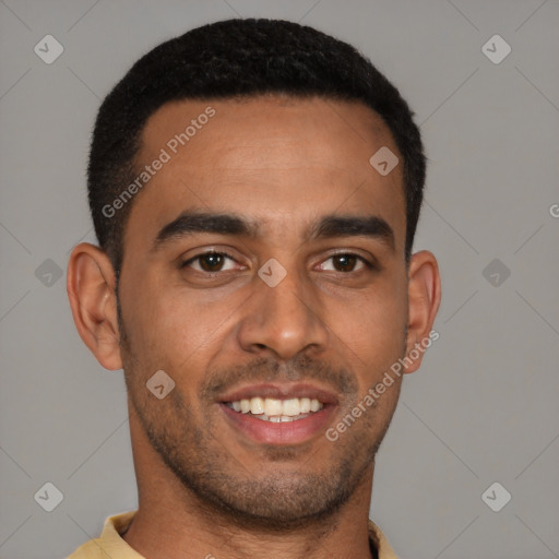 Joyful latino young-adult male with short  brown hair and brown eyes