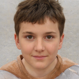 Joyful white child male with short  brown hair and brown eyes