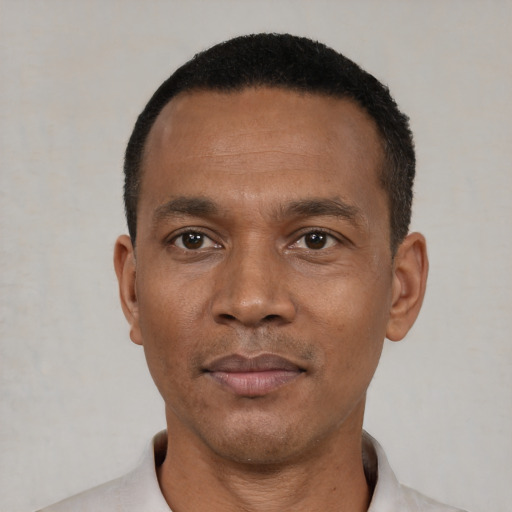 Neutral black adult male with short  black hair and brown eyes