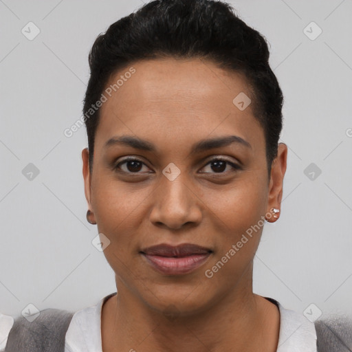 Joyful latino young-adult female with short  black hair and brown eyes