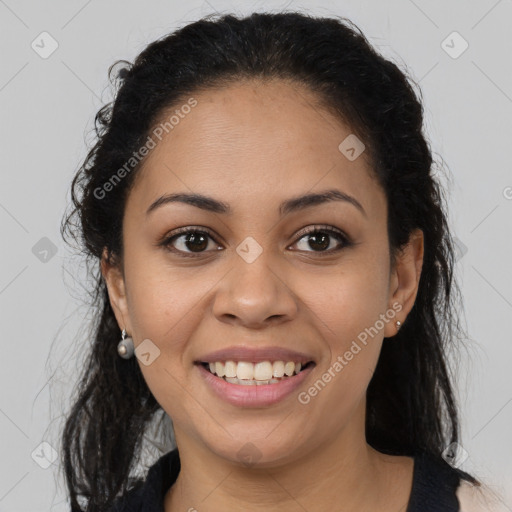 Joyful latino young-adult female with medium  brown hair and brown eyes