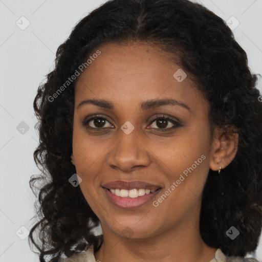 Joyful black young-adult female with medium  brown hair and brown eyes