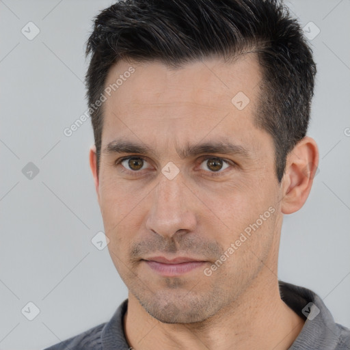 Neutral white adult male with short  black hair and brown eyes