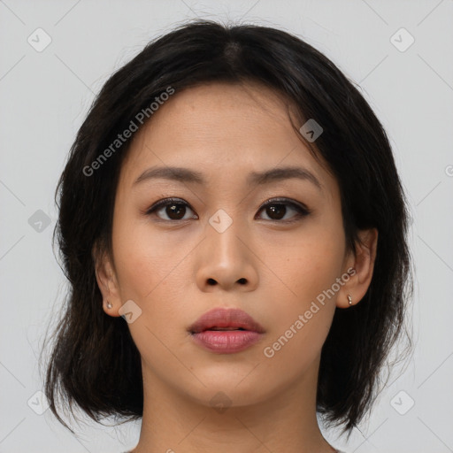 Neutral asian young-adult female with medium  brown hair and brown eyes