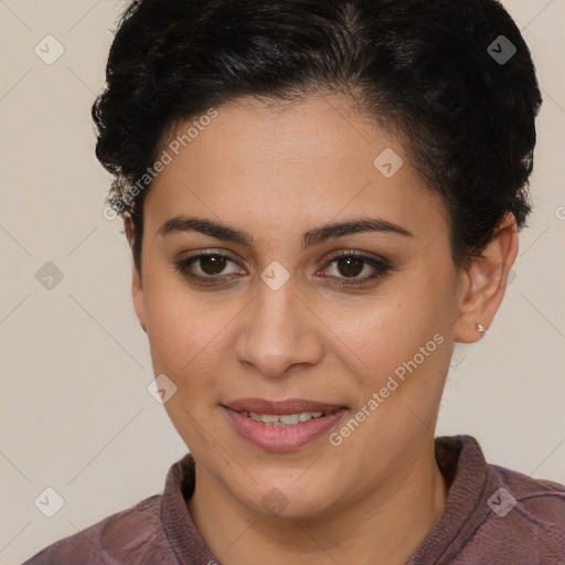 Joyful latino young-adult female with short  brown hair and brown eyes