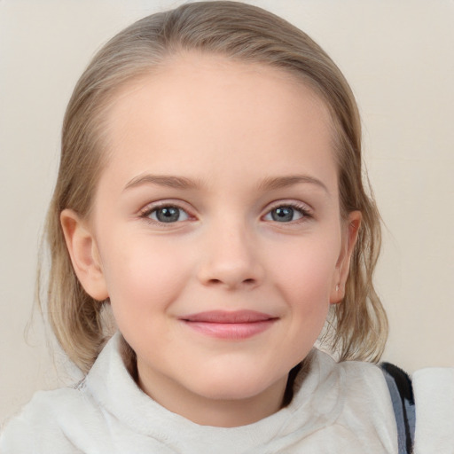 Joyful white child female with medium  brown hair and blue eyes