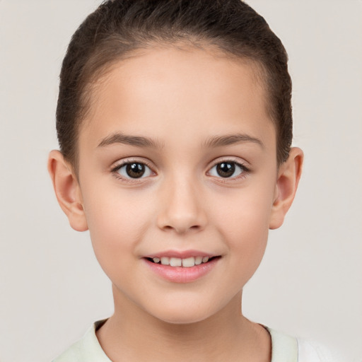 Joyful white child female with short  brown hair and brown eyes