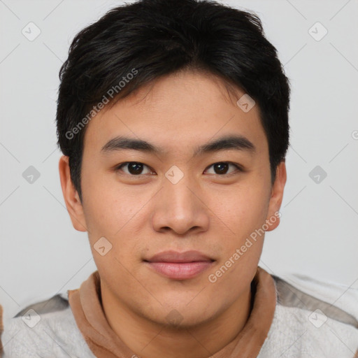 Joyful asian young-adult male with short  black hair and brown eyes