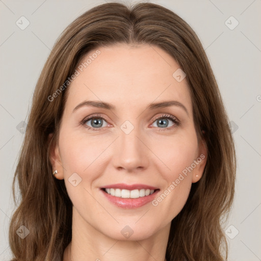 Joyful white young-adult female with medium  brown hair and green eyes