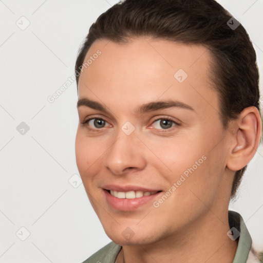 Joyful white young-adult female with short  brown hair and brown eyes