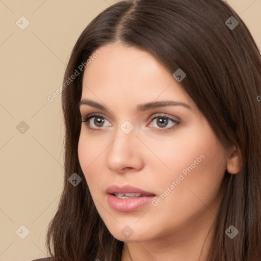 Neutral white young-adult female with long  brown hair and brown eyes