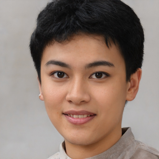 Joyful asian young-adult female with short  black hair and brown eyes