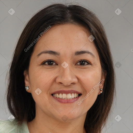 Joyful white adult female with medium  brown hair and brown eyes