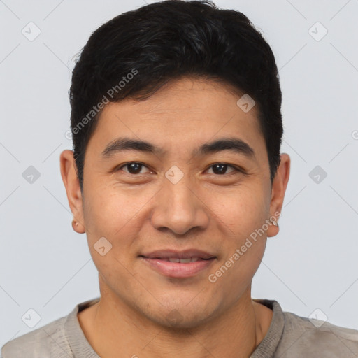 Joyful asian young-adult male with short  brown hair and brown eyes